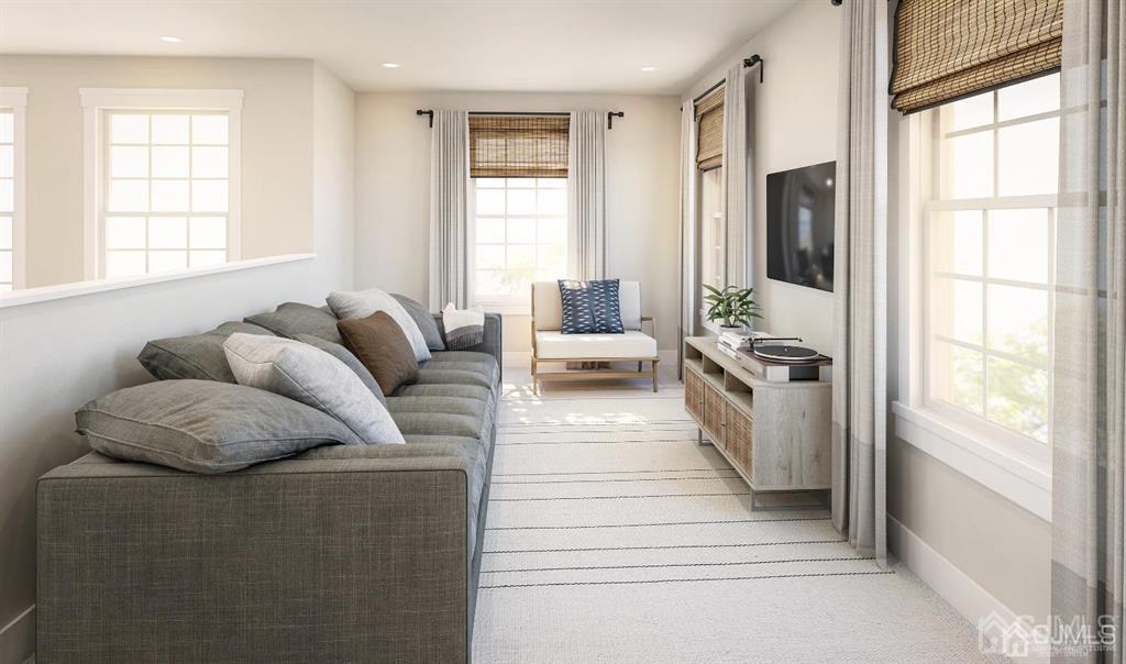 728 Station Road, Unit 524 Dunellen, NJ 08812 - Photo 9 of 11 a living room with furniture and a large window
