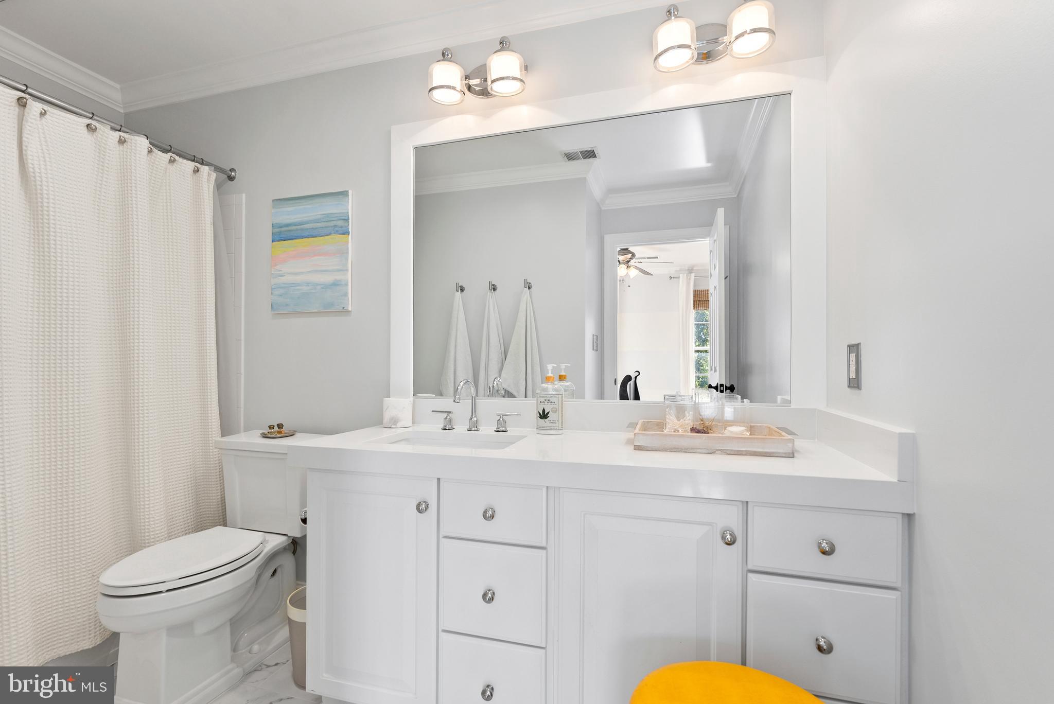 7 Redtree Lane Reisterstown, MD 21136 - Photo 41 of 56 a bathroom with a toilet a sink a tub and mirror