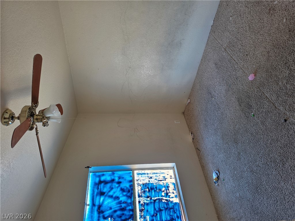 4231 West Wilson Road Pahrump, NV 89048 - Photo 8 of 19 A spacious bedroom awaits your creative vision and custom updates.