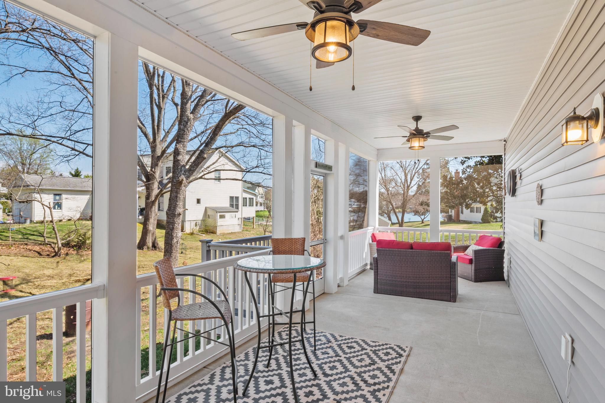 1002 Skiff Cove Road Edgewater, MD 21037 - Photo 5 of 47 Screened In Patio with water view