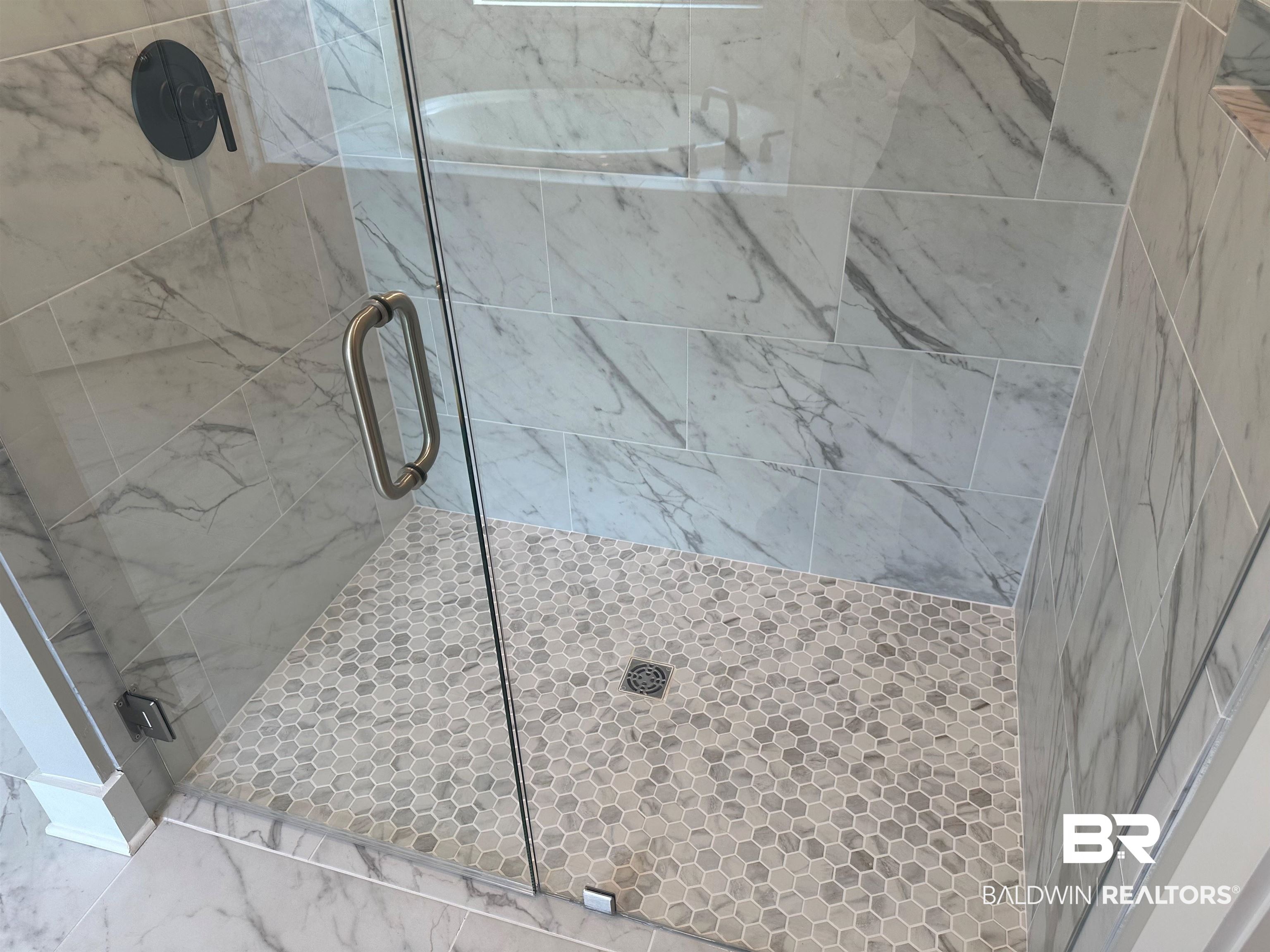 23548 Travis Stock Street, Unit 50 Foley, AL 36535 - Photo 22 of 30 Primary bathroom tile shower