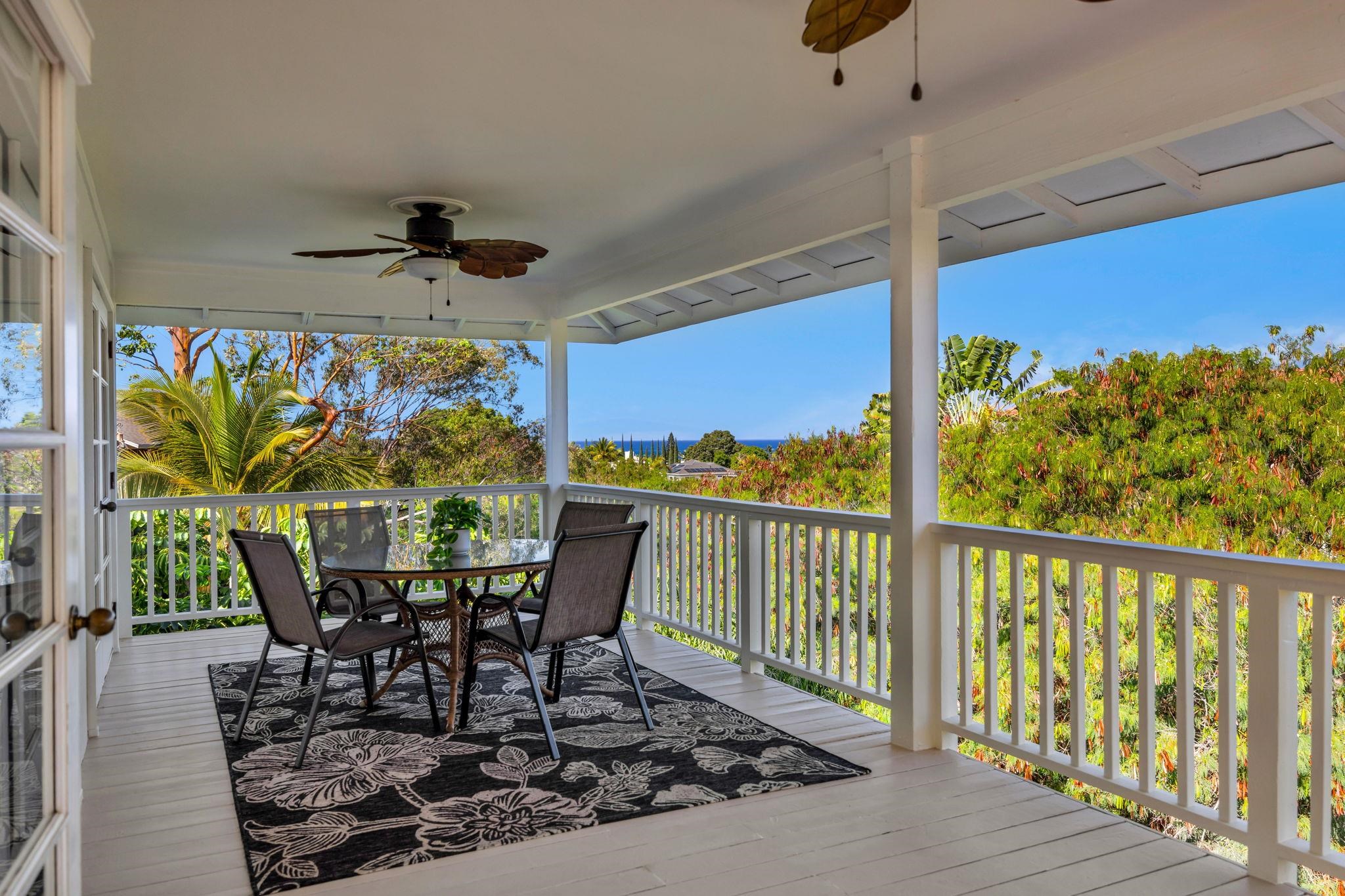 235 Keonekai Road Kihei, HI 96753 - Photo 12 of 50 a view of a porch with furniture and a yard