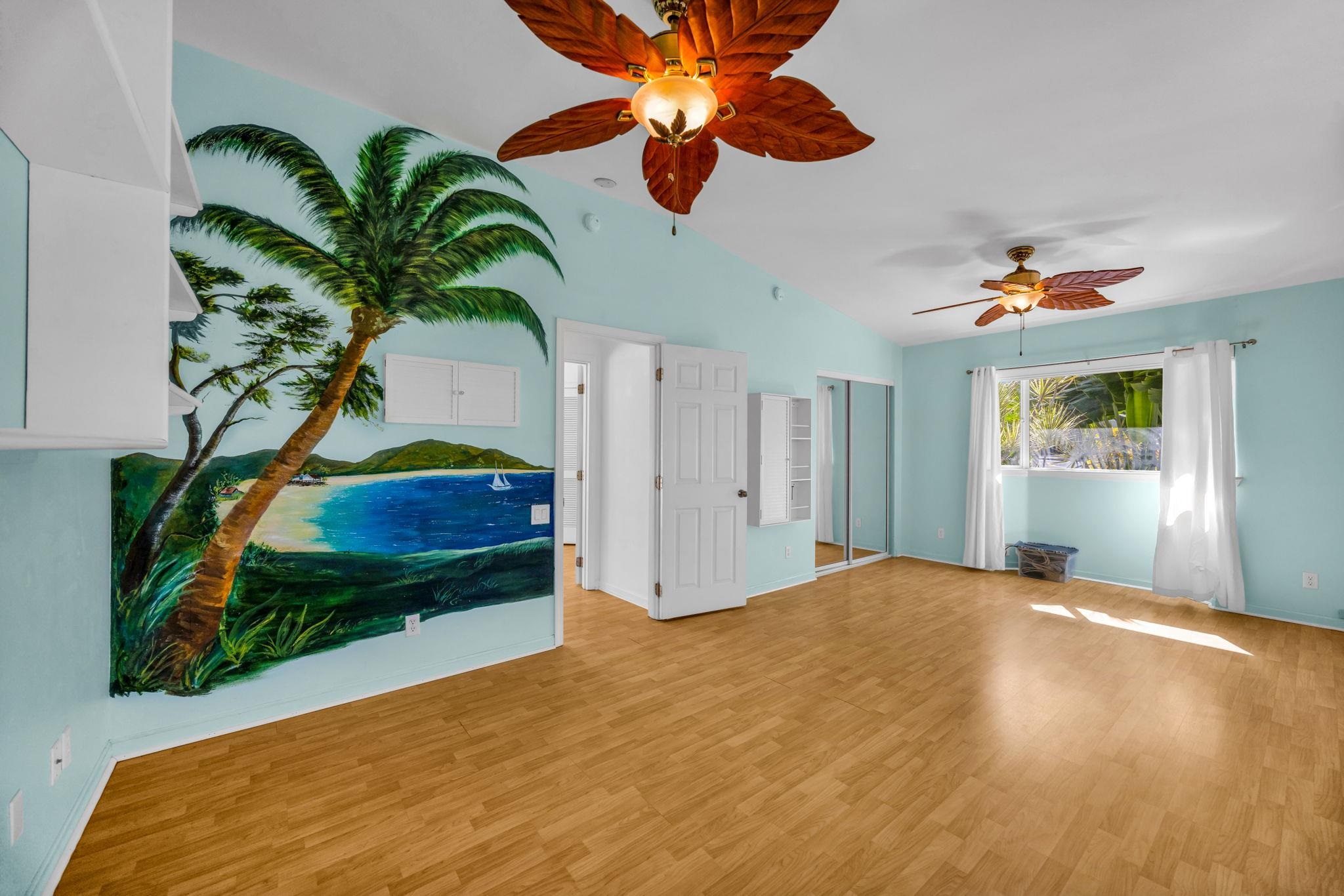 235 Keonekai Road Kihei, HI 96753 - Photo 31 of 50 a living room with a potted plant