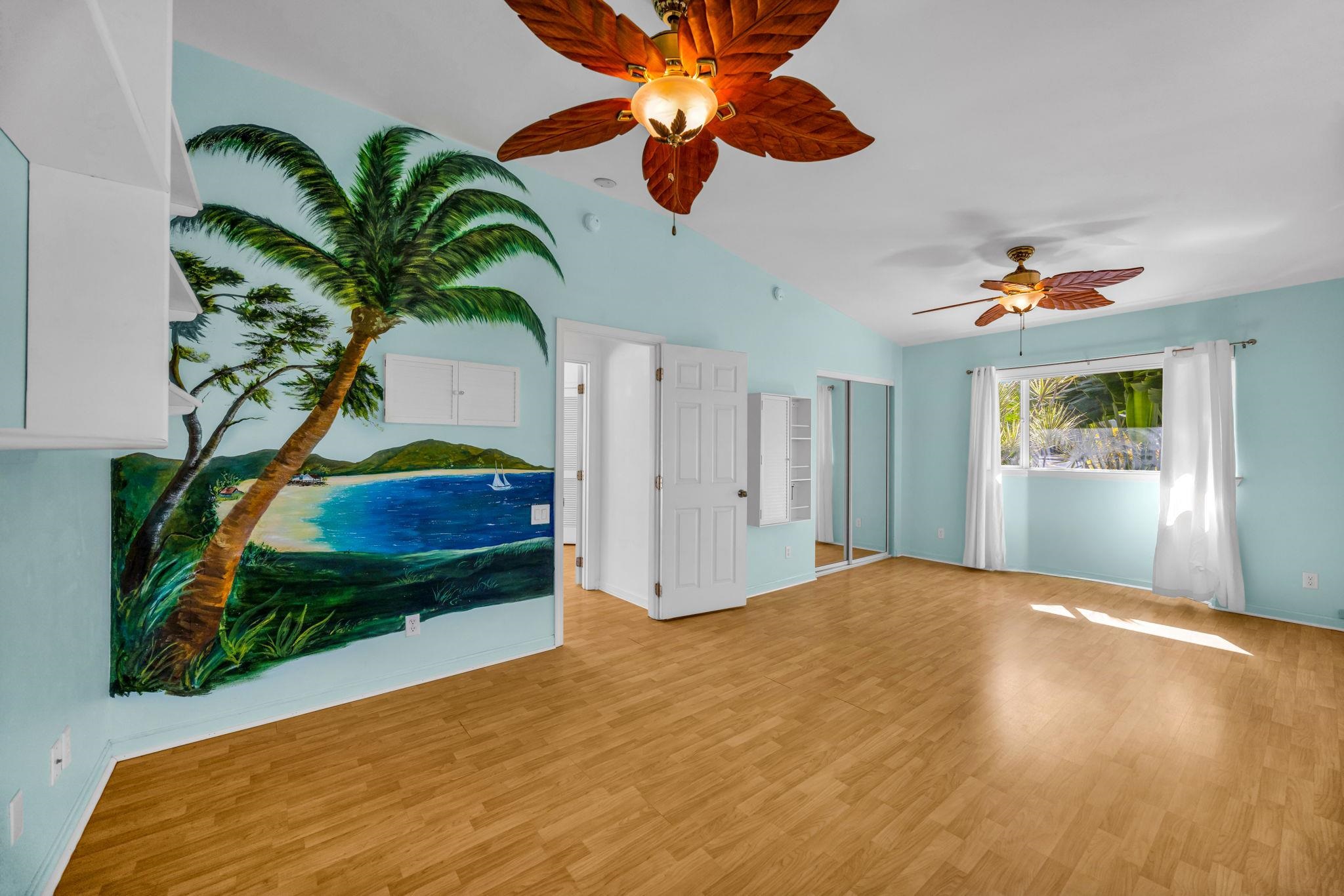 235 Keonekai Road Kihei, HI 96753 - Photo 31 of 50 a living room with a potted plant