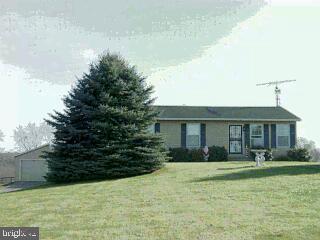 1629 Kbs Road Spring Grove, PA 17362 - Photo 1 of 1 a front view of a house with garden