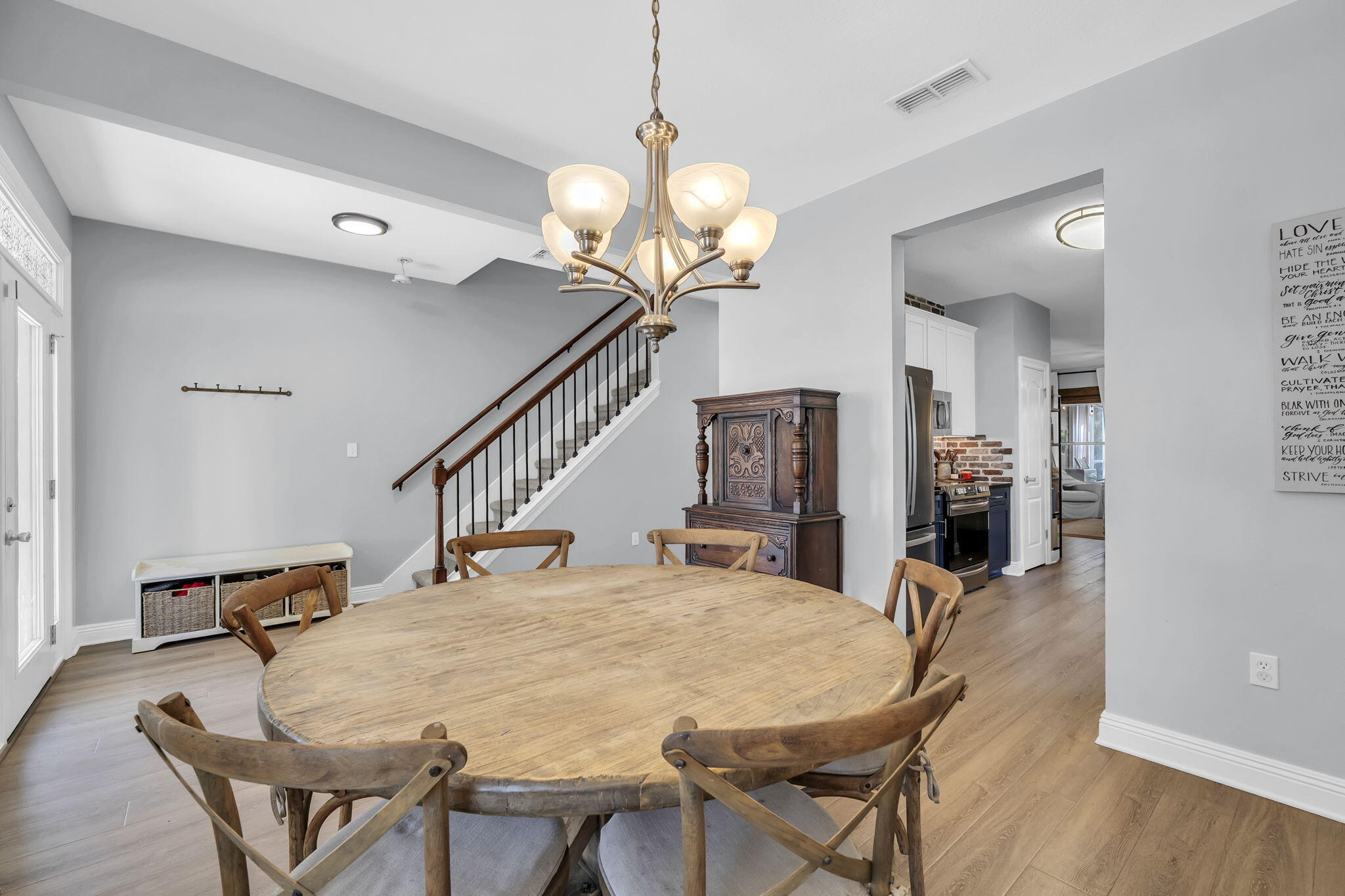 98 Bald Eagle Drive Santa Rosa Beach, FL 32459 - Photo 11 of 48 a dining room with furniture and wooden floor