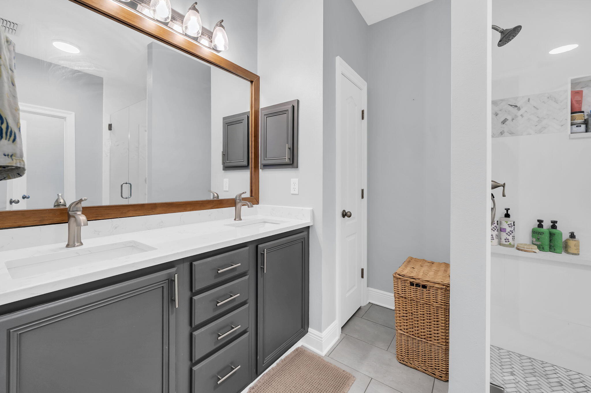 98 Bald Eagle Drive Santa Rosa Beach, FL 32459 - Photo 23 of 48 a bathroom with a sink and a mirror