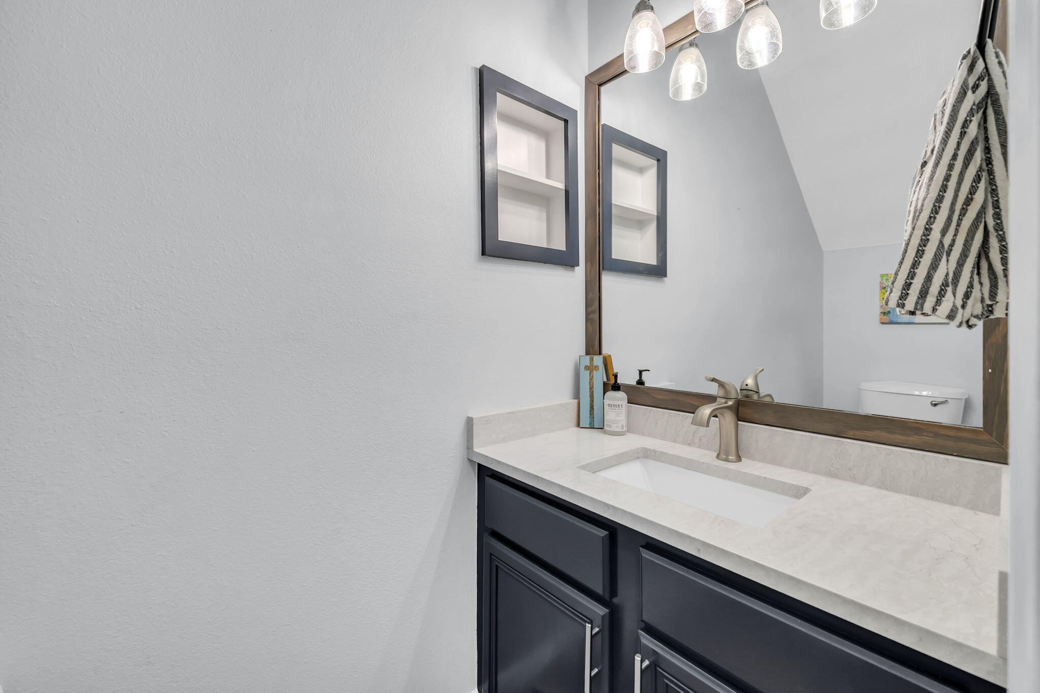 98 Bald Eagle Drive Santa Rosa Beach, FL 32459 - Photo 26 of 48 a bathroom with a sink and a mirror