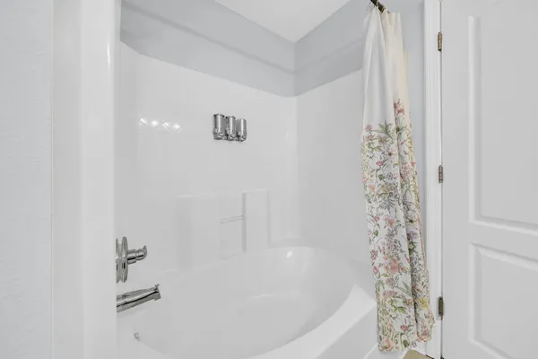 a bathroom with a bathtub