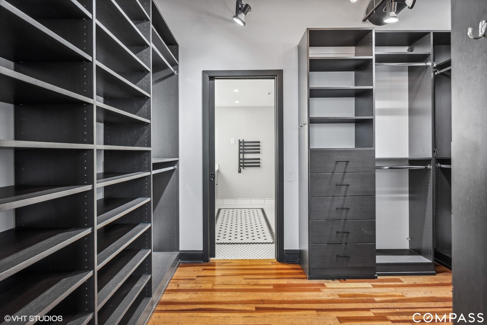 850 West Adams Street, Unit 2E Chicago, IL 60607 - Photo 21 of 36 a view of a hallway with wooden floor and staircase