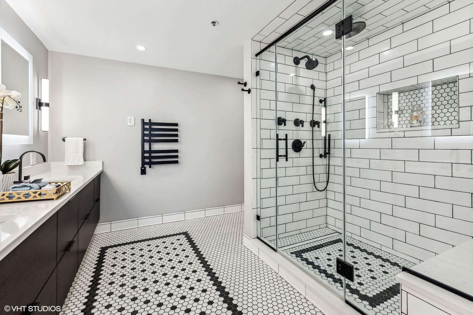 850 West Adams Street, Unit 2E Chicago, IL 60607 - Photo 24 of 36 a bathroom with a sink a toilet and shower
