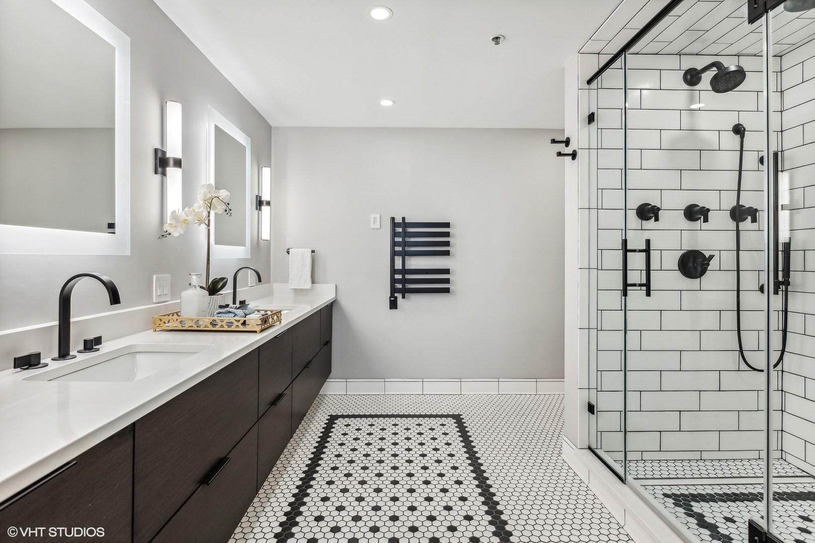 850 West Adams Street, Unit 2E Chicago, IL 60607 - Photo 25 of 36 a bathroom with a double vanity sink a toilet and shower