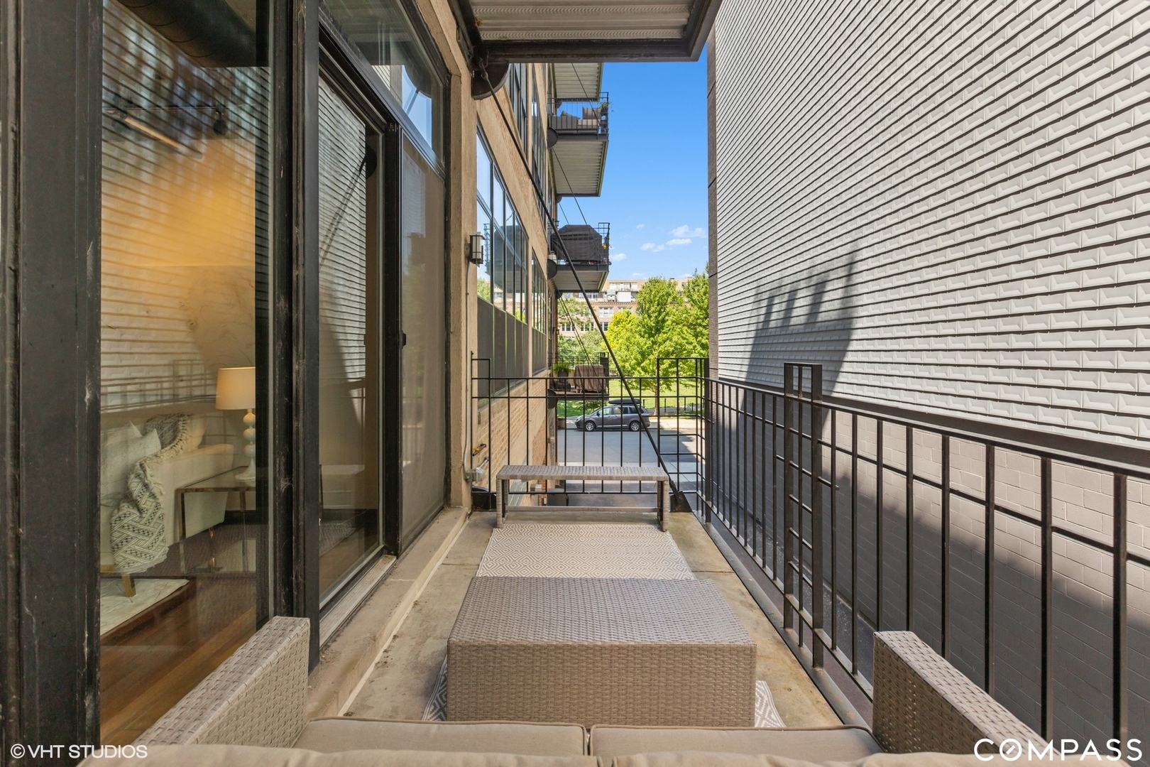 850 West Adams Street, Unit 2E Chicago, IL 60607 - Photo 32 of 36 a view of a balcony with a potted plant