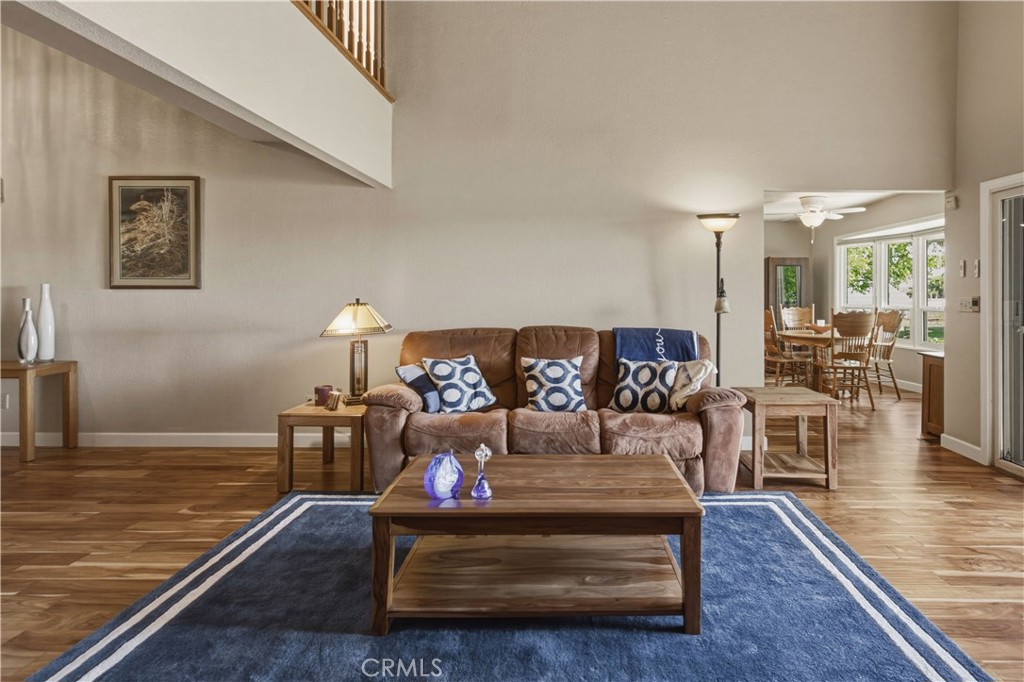 3856 North Gardner Avenue Merced, CA 95340 - Photo 16 of 59 a living room with furniture and wooden floor