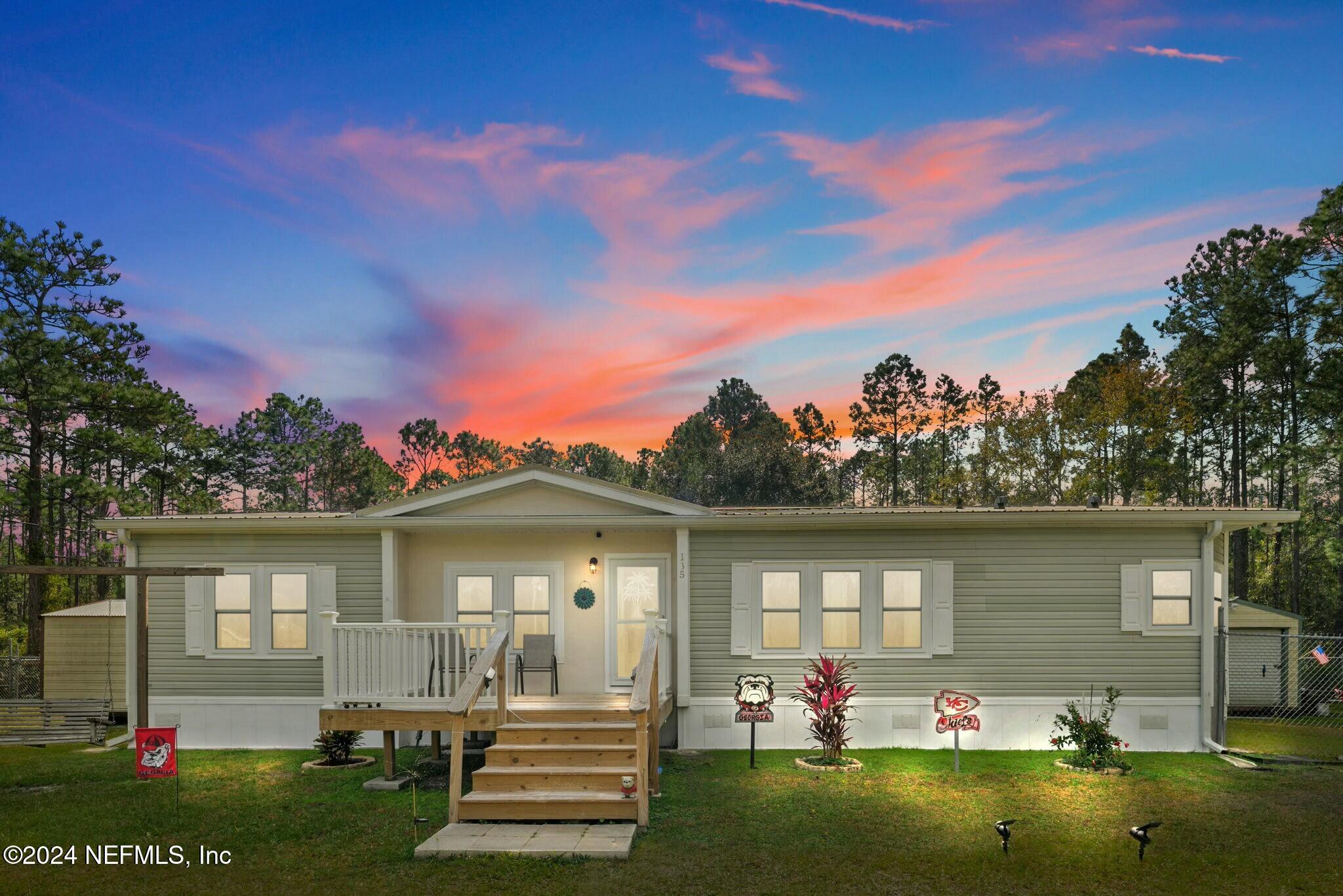 135 East Satsuma Road Palatka, FL 32177 - Photo 2 of 32 Front evening view