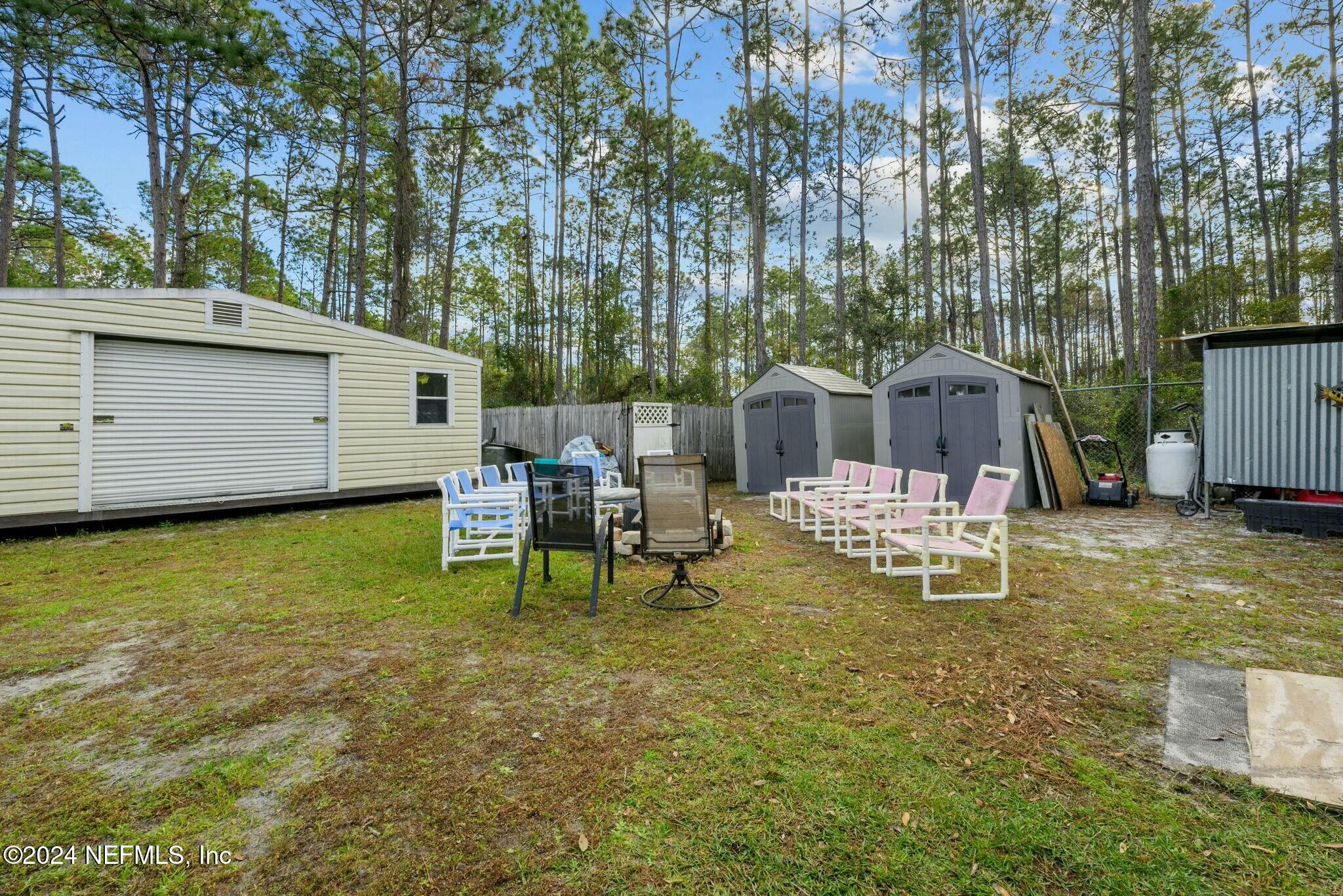 135 East Satsuma Road Palatka, FL 32177 - Photo 29 of 32 Firepit & sheds