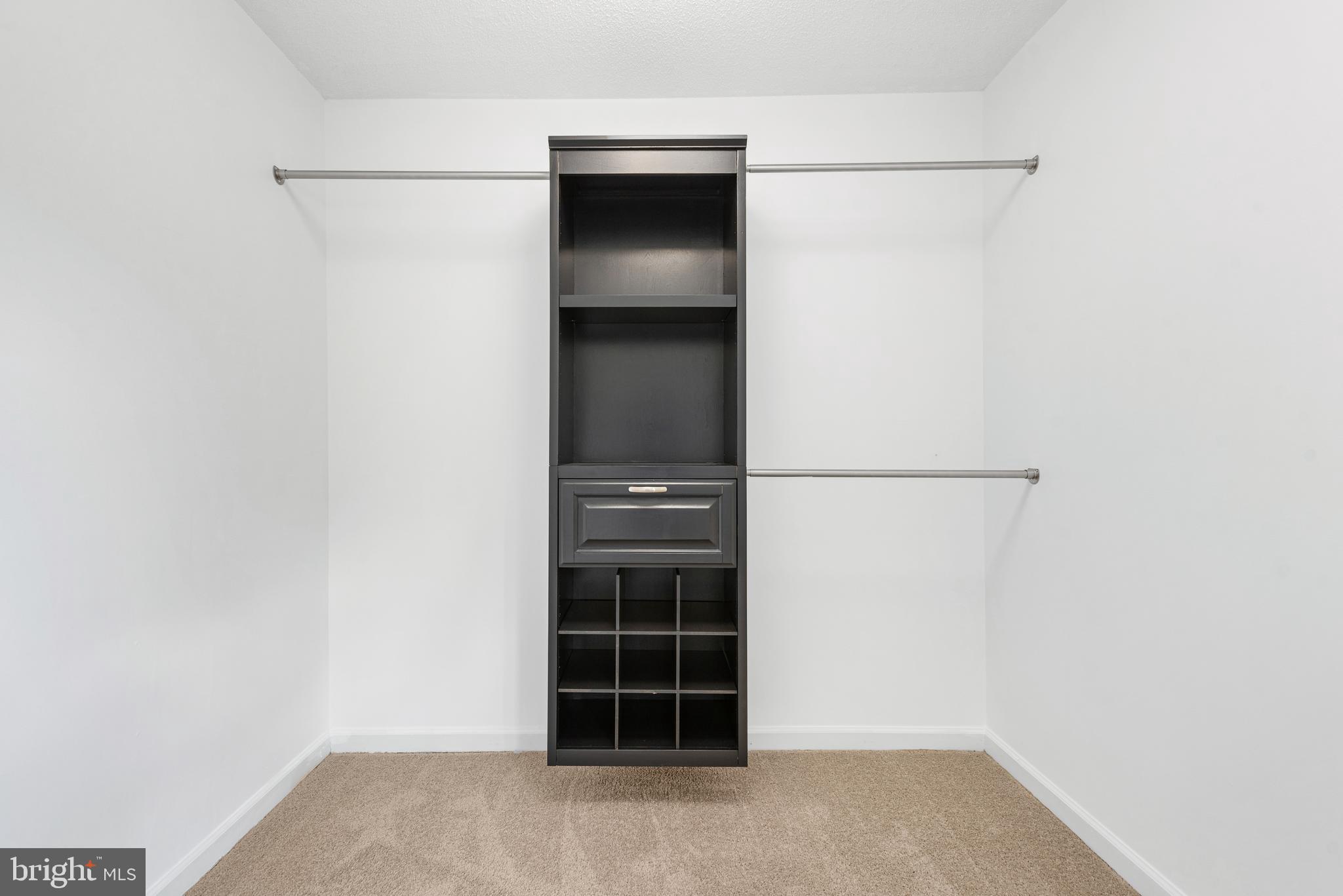 12004 Taliesin Place, Unit 32 Reston, VA 20190 - Photo 19 of 26 a view of an empty room with a cabinet