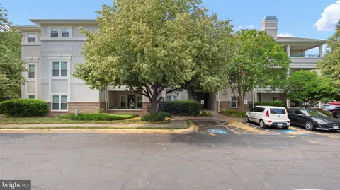 a view of street with parked cars