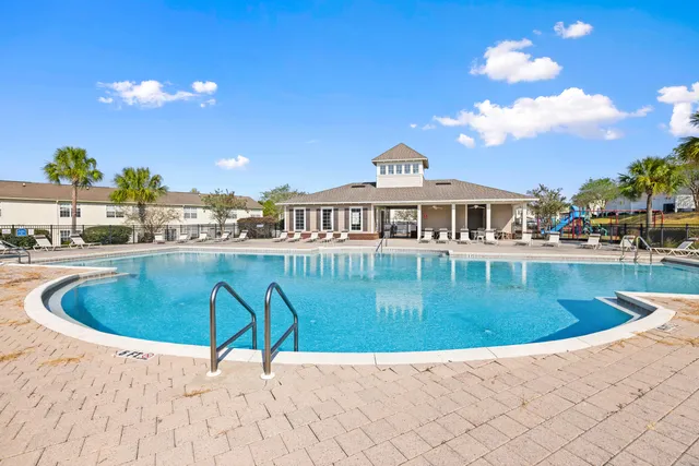 a view of a swimming pool and a terrace