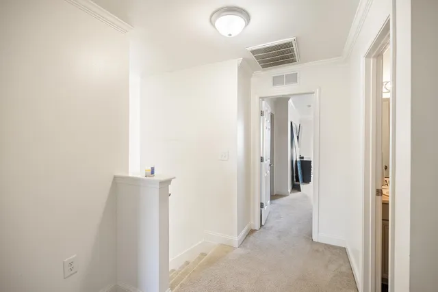 a view of a hallway with closet