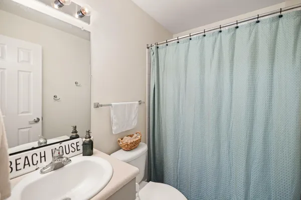 a bathroom with a sink and a toilet