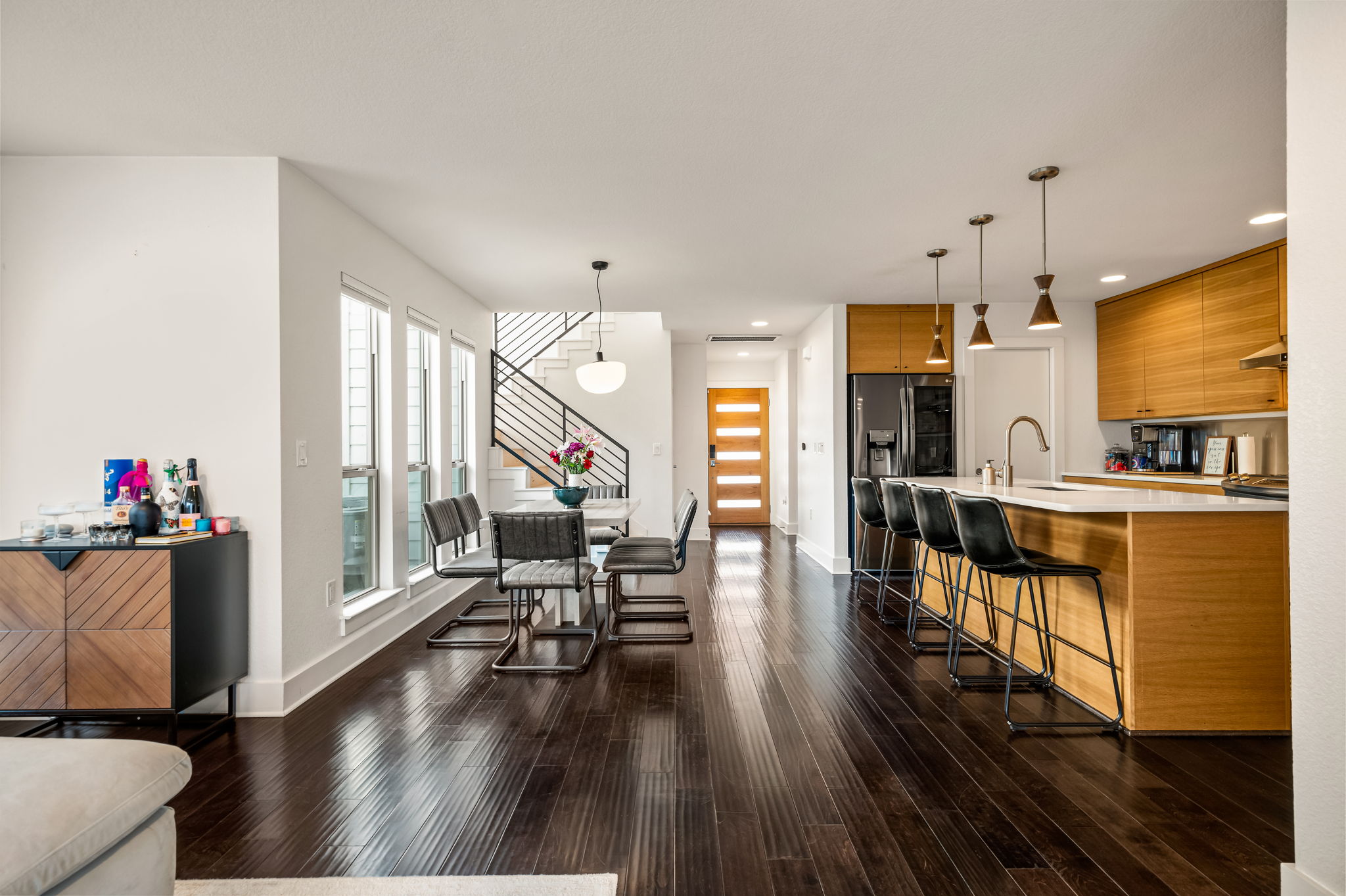 1124 Linden Street, Unit B Austin, TX 78702 - Photo 2 of 26 Dining room featuring stairway and dark wood-type flooring