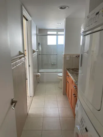 a bathroom with sink and mirror