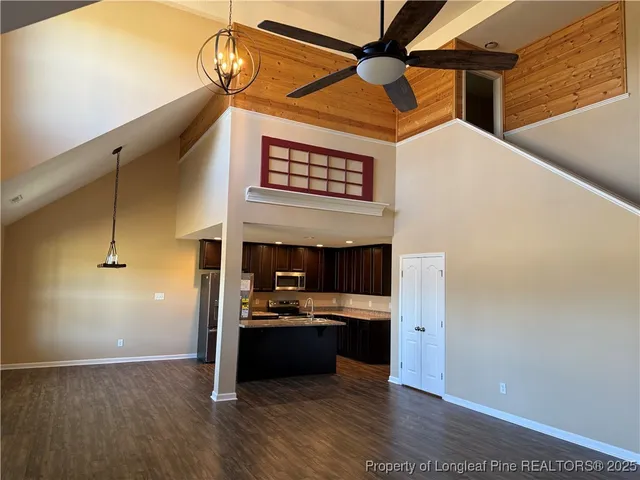 a view of a kitchen and a window