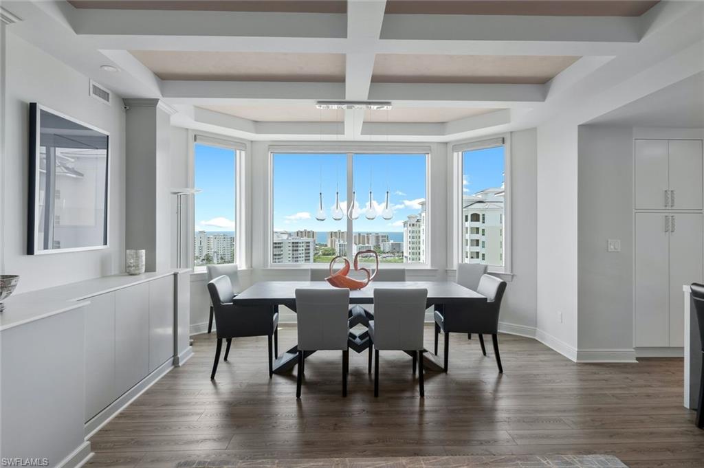 275 Indies Way, Unit 1701 Naples, FL 34110 - Photo 28 of 32 a view of a dining room with furniture window and outside view
