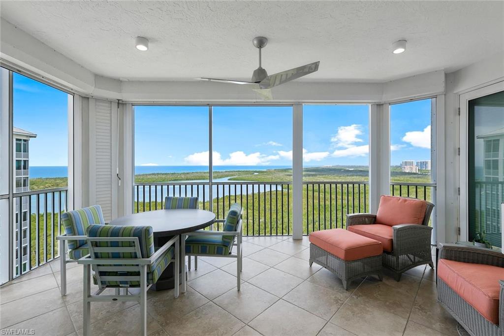 275 Indies Way, Unit 1701 Naples, FL 34110 - Photo 29 of 32 a balcony with furniture and a window