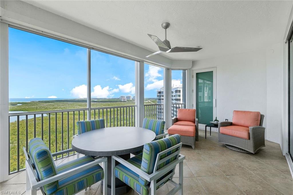 275 Indies Way, Unit 1701 Naples, FL 34110 - Photo 30 of 32 a balcony with furniture