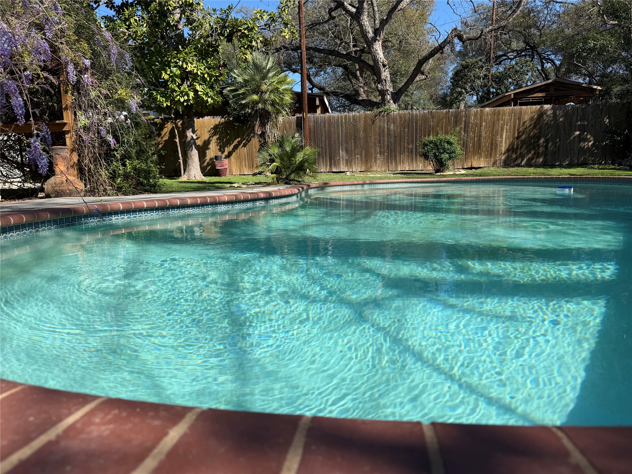301 Sheraton Avenue Austin, TX 78745 - Photo 1 of 27 Fabulous, sparkling pool n a big backyard with mature trees and plenty of room to play and garden.