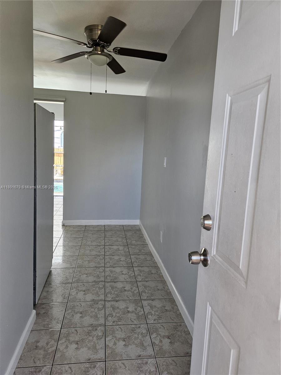 5849 Wiley Street, Unit 2 Hollywood, FL 33023 - Photo 7 of 10 a view of a hallway