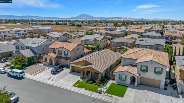 an aerial view of a house with a garden