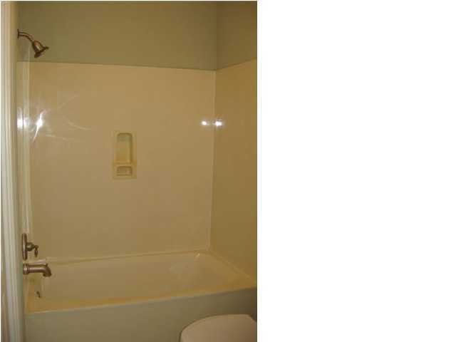 263 Diamond Cove, Unit 263 Destin, FL 32541 - Photo 12 of 24 a bathroom with a shower