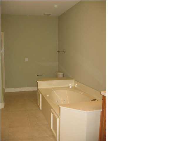 263 Diamond Cove, Unit 263 Destin, FL 32541 - Photo 15 of 24 a utility room with a sink