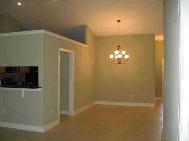 263 Diamond Cove, Unit 263 Destin, FL 32541 - Photo 8 of 24 a view of a chandelier in big room