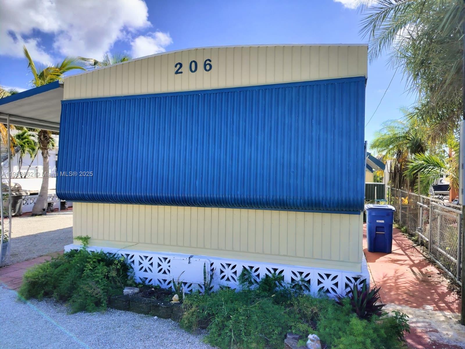 206 West 2nd Court Key Largo, FL 33037 - Photo 12 of 53 a view of an entrance to house