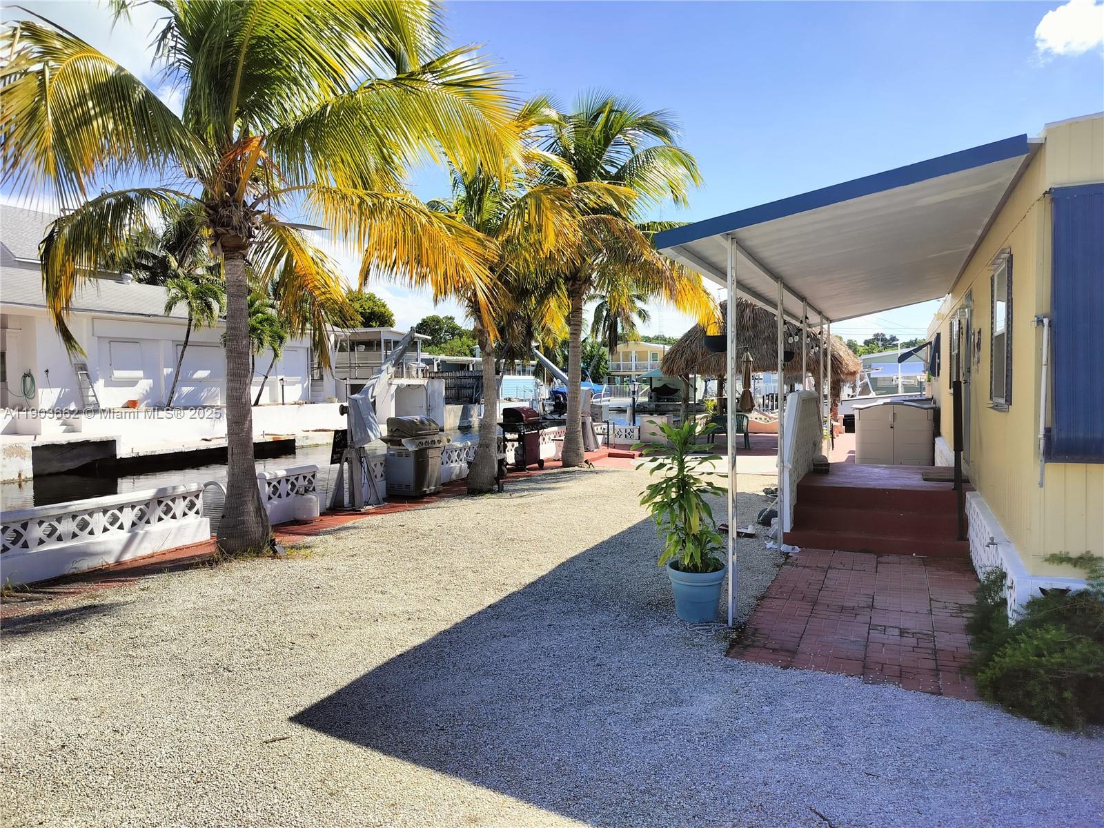 206 West 2nd Court Key Largo, FL 33037 - Photo 14 of 53 a view of outdoor space with outdoor seating
