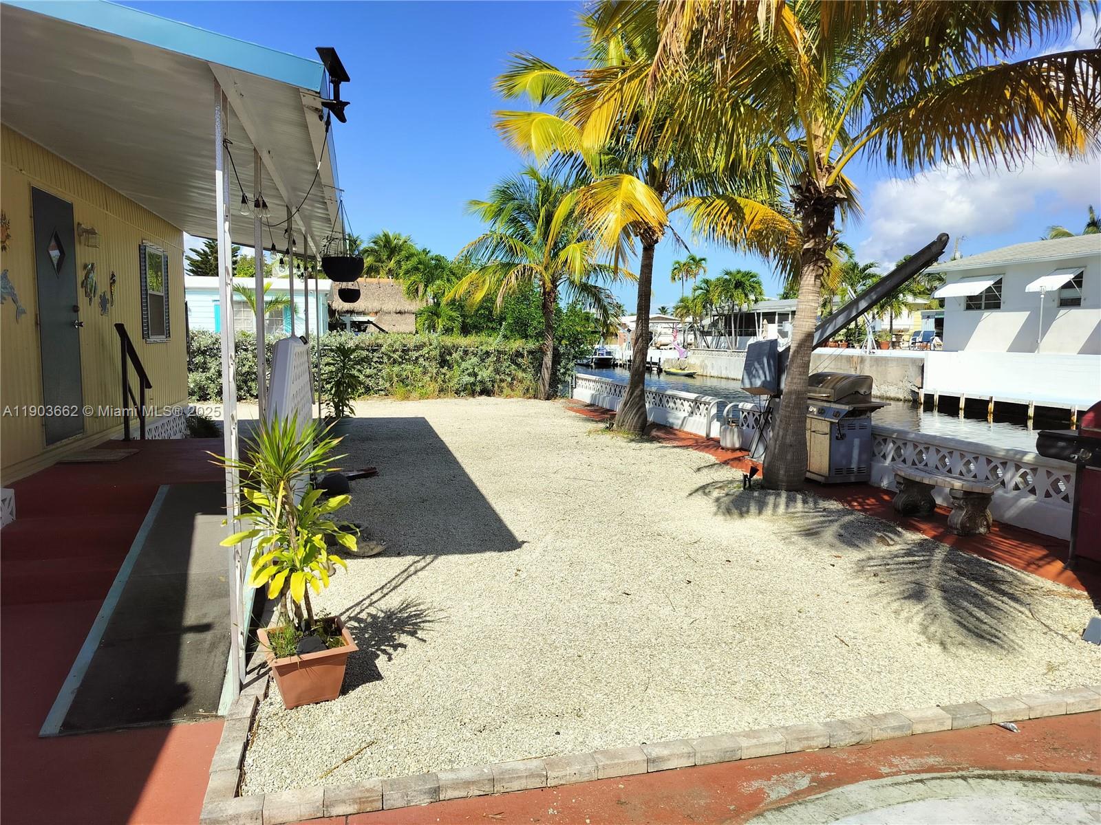 206 West 2nd Court Key Largo, FL 33037 - Photo 16 of 53 a view of outdoor space yard and porch