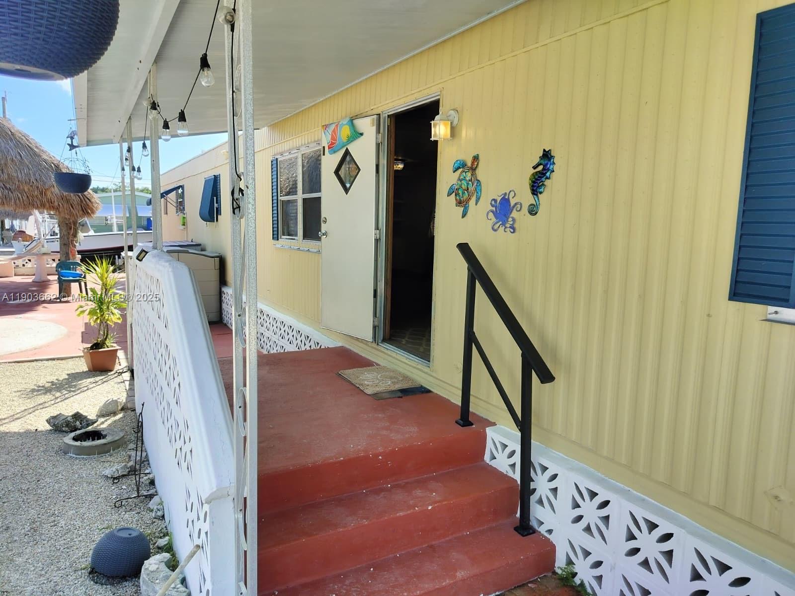206 West 2nd Court Key Largo, FL 33037 - Photo 2 of 53 a view of entryway