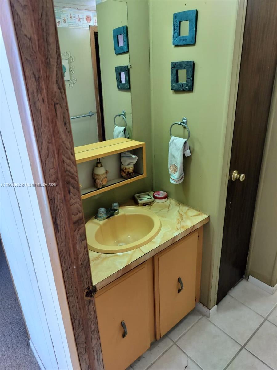 206 West 2nd Court Key Largo, FL 33037 - Photo 25 of 53 a utility room with dryer and washer