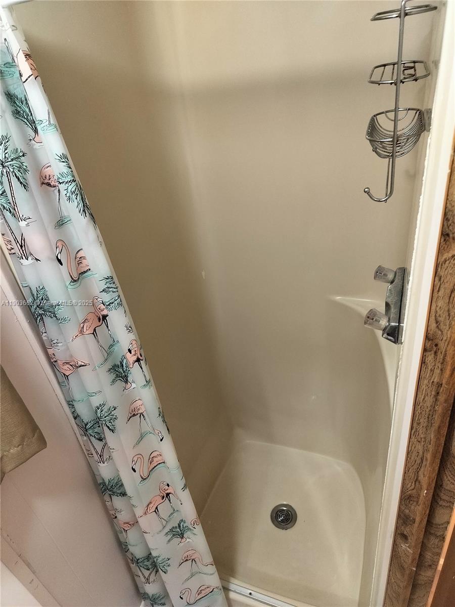 206 West 2nd Court Key Largo, FL 33037 - Photo 38 of 53 a bathroom with a shower