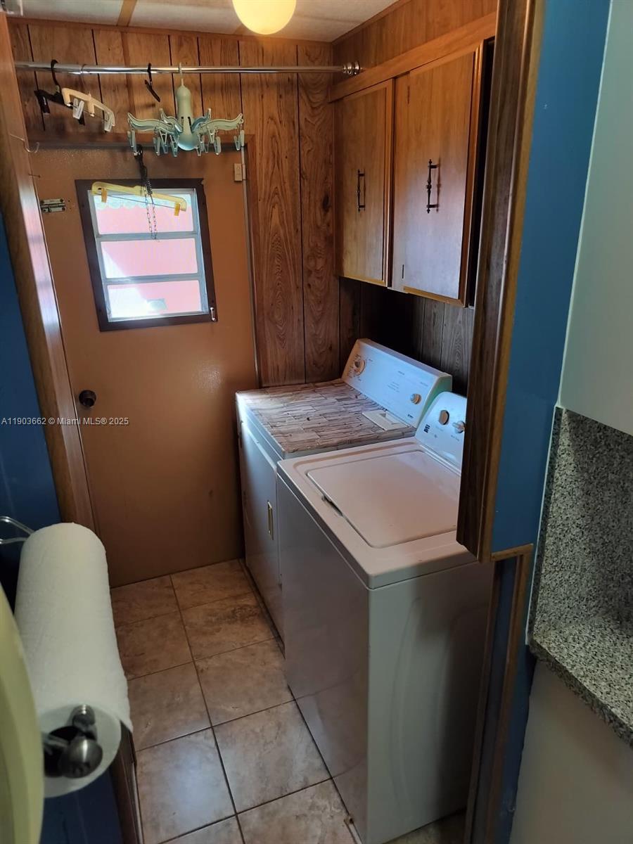 206 West 2nd Court Key Largo, FL 33037 - Photo 39 of 53 a utility room with dryer and washer