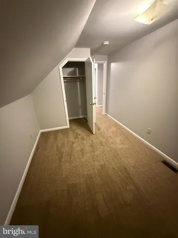 an empty room with closet