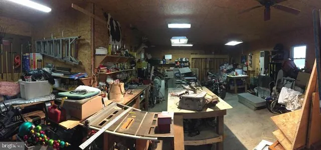 a room with lots of furniture and clutter