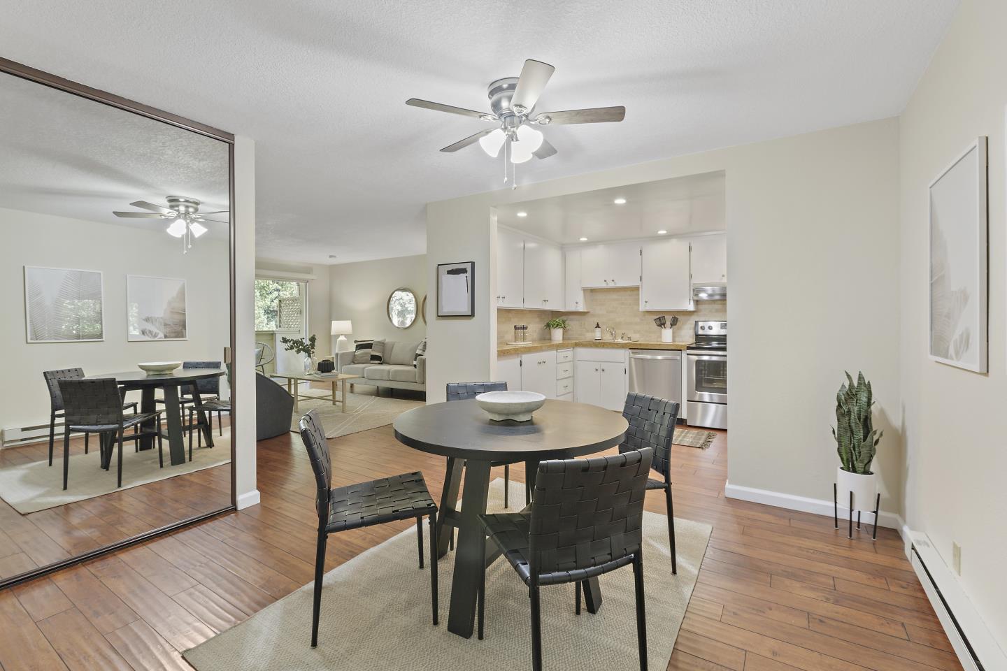 a dining room with furniture and window