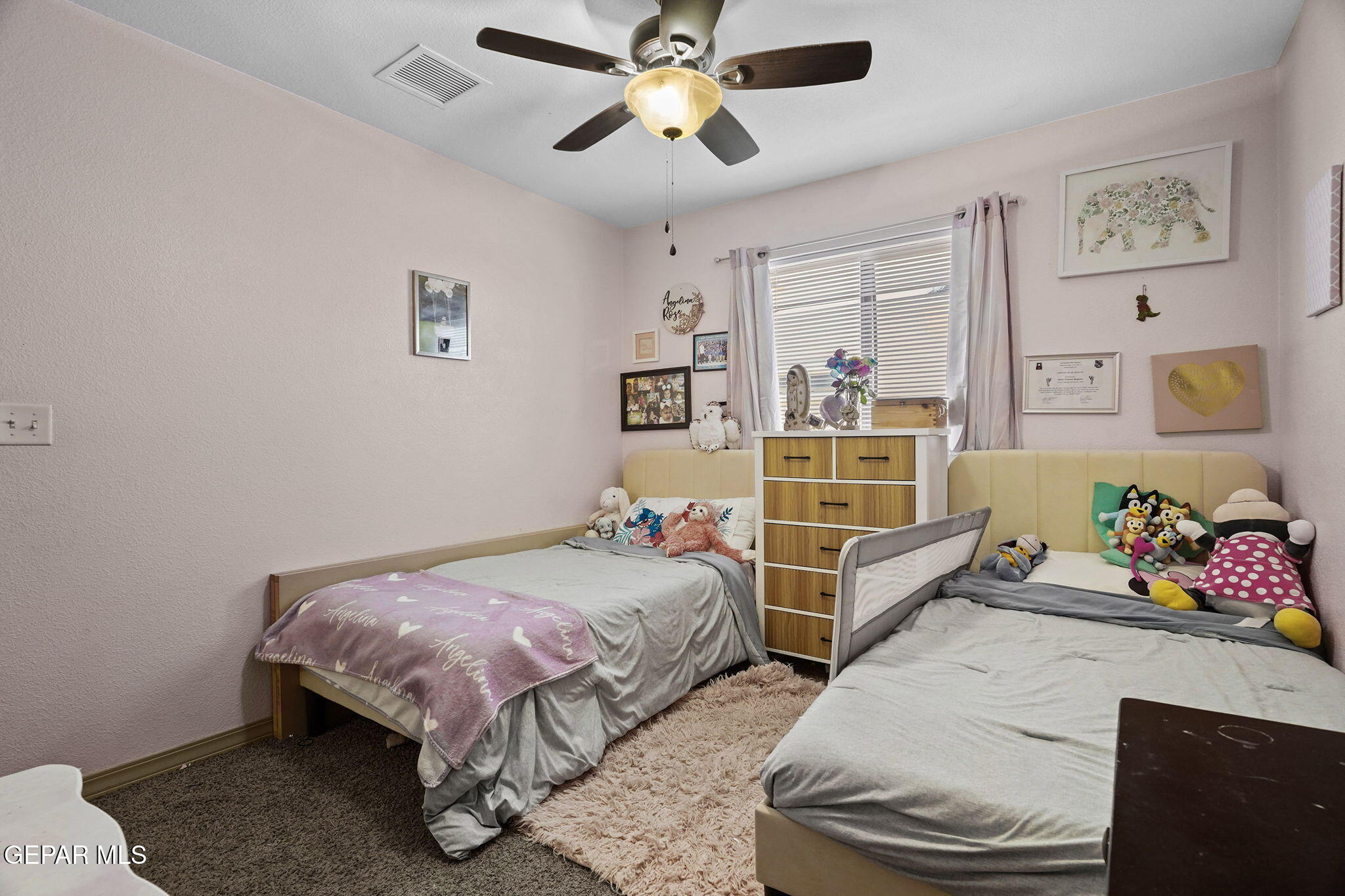3152 Rustic Hidden Drive El Paso, TX 79938 - Photo 23 of 38 a bedroom with a bed and wooden floor