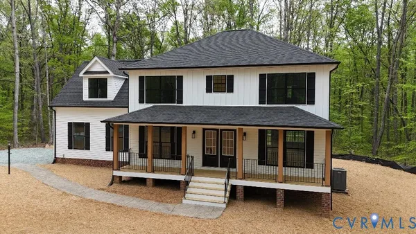 a front view of a house with a porch