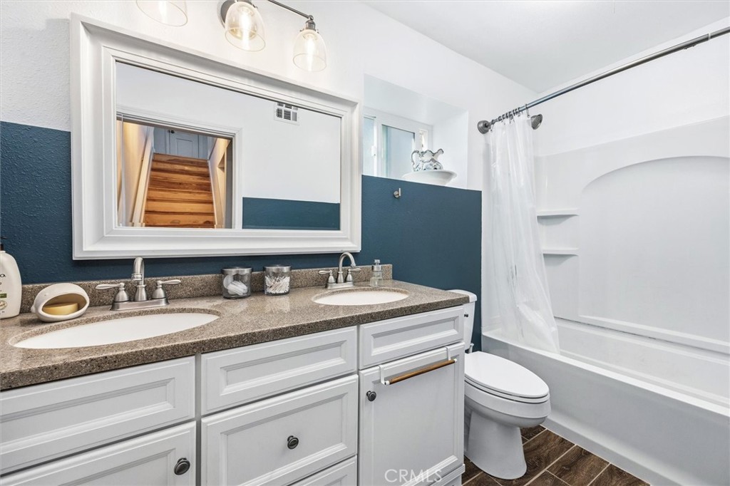 5201 Juarez Avenue Atascadero, CA 93422 - Photo 20 of 35 The downstairs bathroom has a double vanity and tub shower